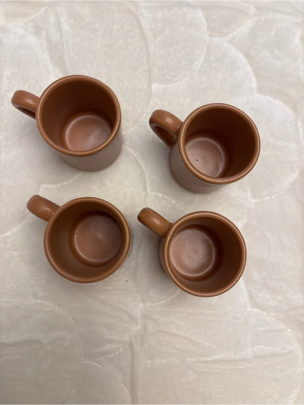 Four brown stoneware pottery expresso shot coffee mugs